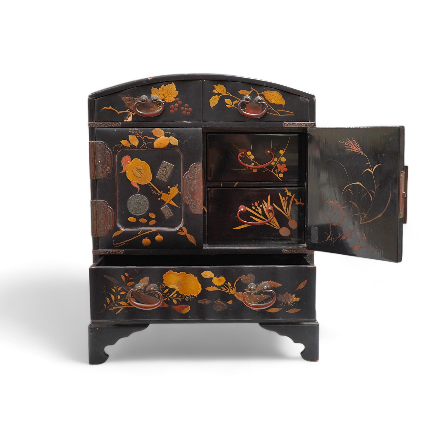 A late 19th early 20th century Japanese lacquer cabinet, 31cm high. Condition - exterior chipped and cracked near the top edge